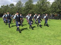 Tweedvale Pipe Band marching up to the line